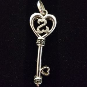 The key to an open heart Kay Jewlers. Sterling silver with diamonds.